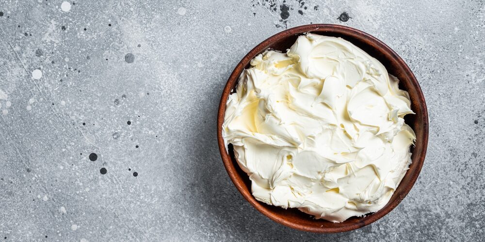 Traditional,Mascarpone,Cheese,In,Wooden,Bowl.,Gray,Background.,Top,View.